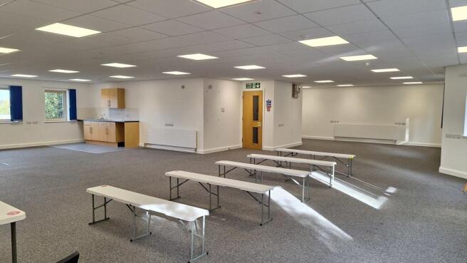 Photo 3. First Floor .