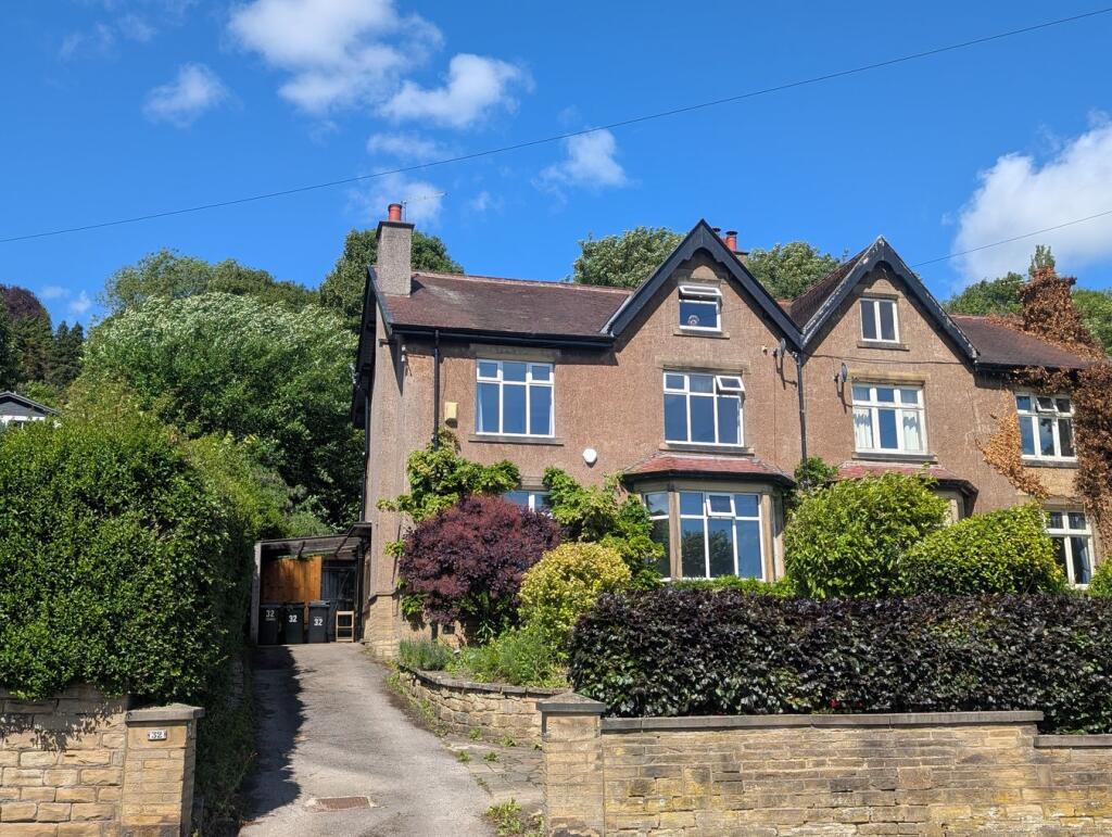 Main image of property: Strathmore, Scott Lane, Riddlesden, Keighley, BD20