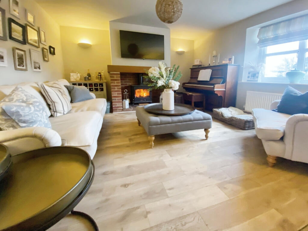 Main image of property: Lavender Cottage, NR10 3JD