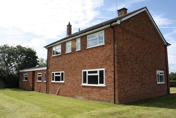 Photo 2. Main front elevation.