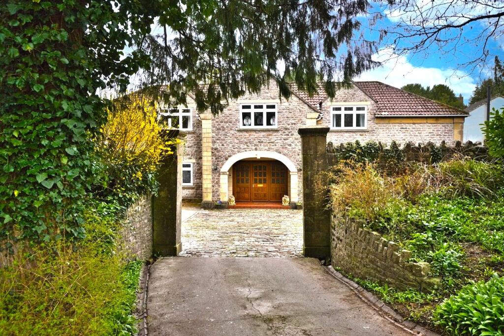 Main image of property: A very spacious five bedroom house with outbuildings in Oakhill