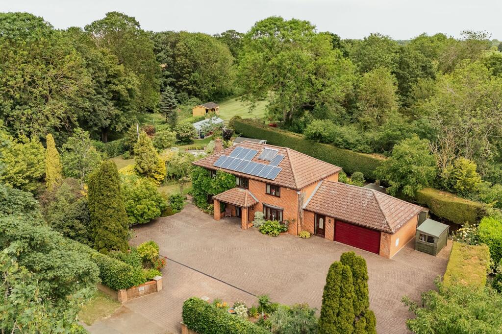 Main image of property: Detached Family Home Set Within Stunning Gardens