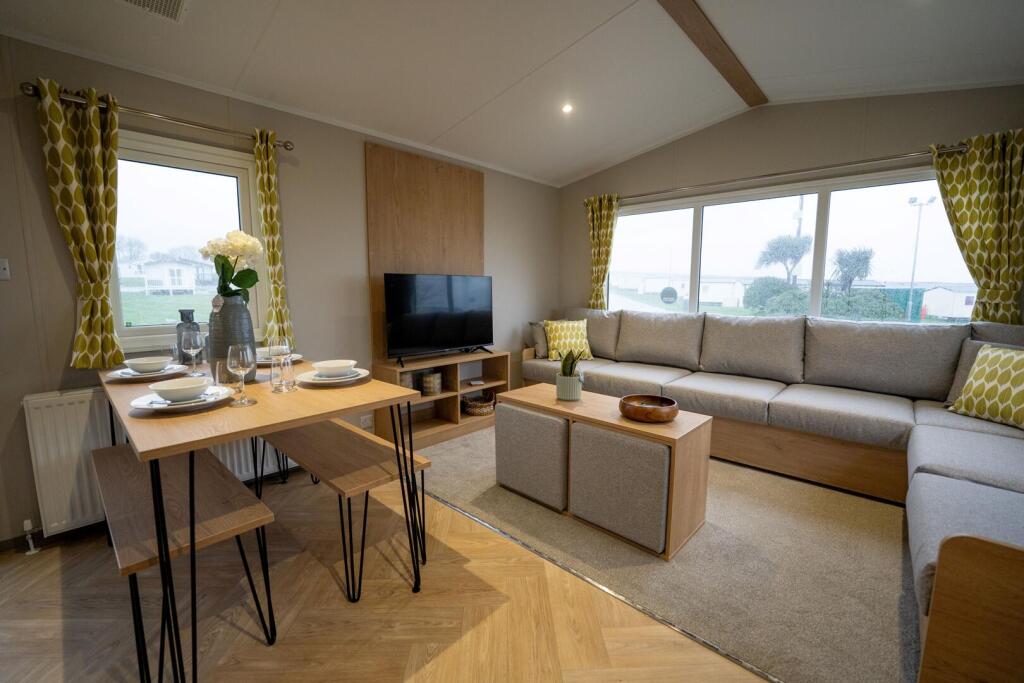 Main image of property: Coopers Beach Holiday Park, Church Lane East Mersea, Colchester, Essex, CO5 8TN