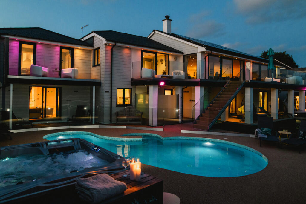 Main image of property: An Exceptional Waterside Residence Overlooking the Gannel Estuary.