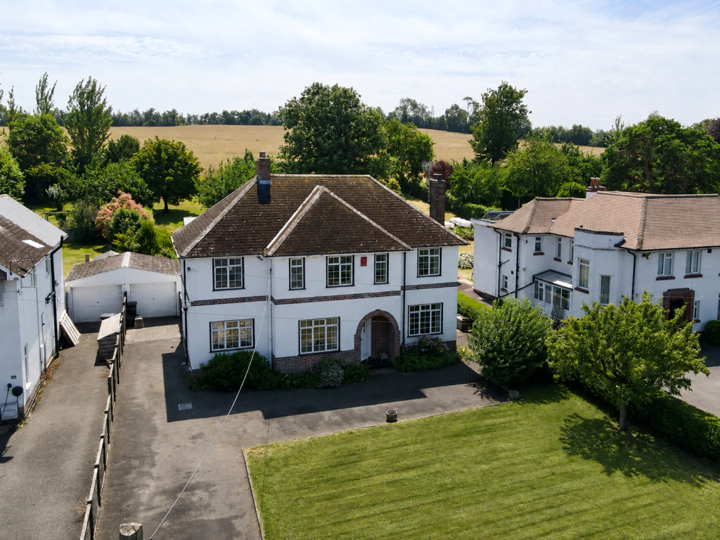 Main image of property: A Rare 1930s Home with Exceptional Gardens & Outstanding Potential