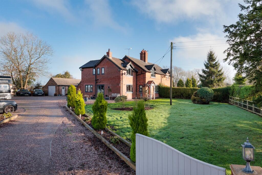 Main image of property:  Refurbished family house with equestrian facilities in Ridley, Tarporley