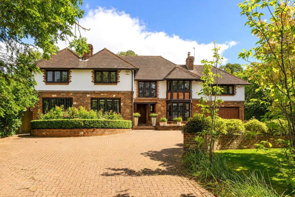 Main image of property: Woodland Drive, East Horsley, KT24