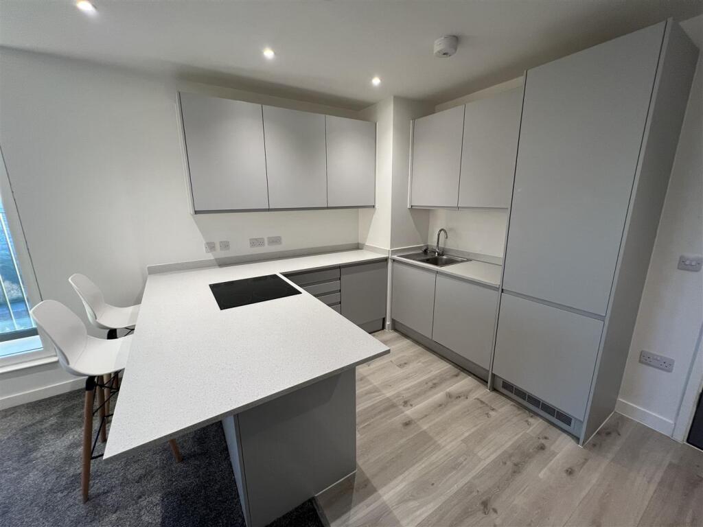 Main image of property: Wharf End, Trafford Park