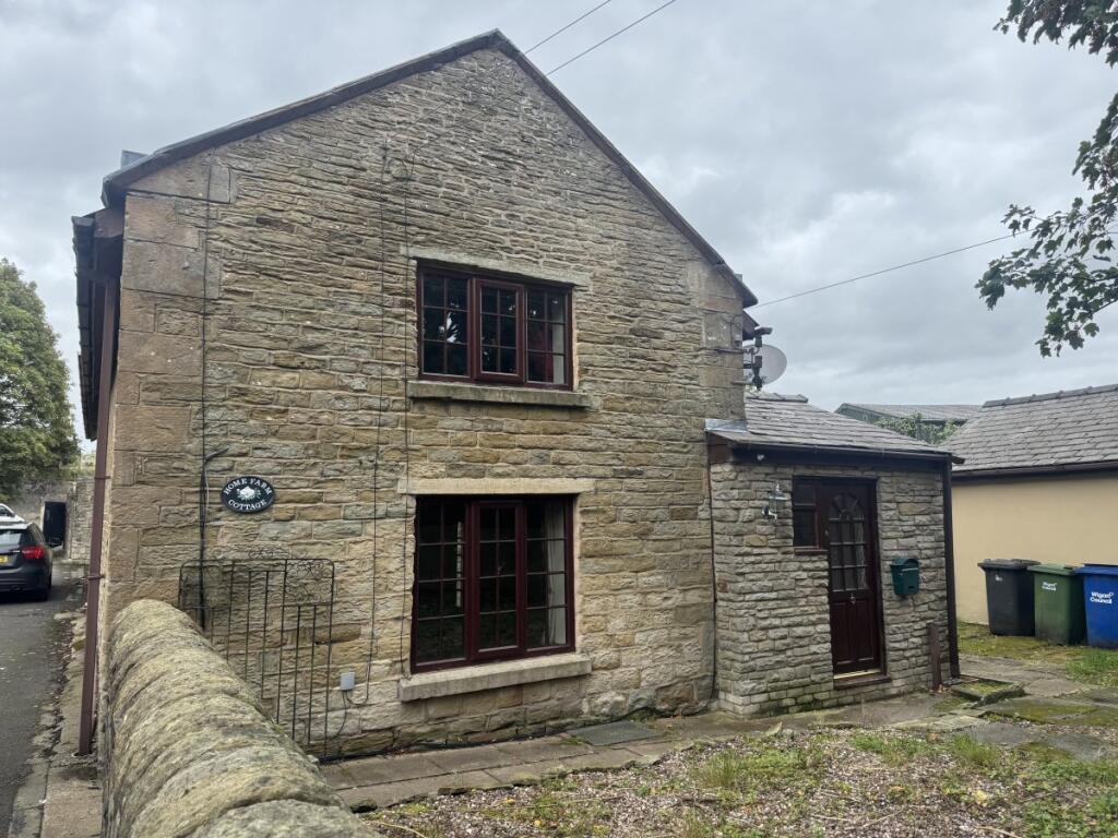 Main image of property: Home Farm Cottage, Wigan