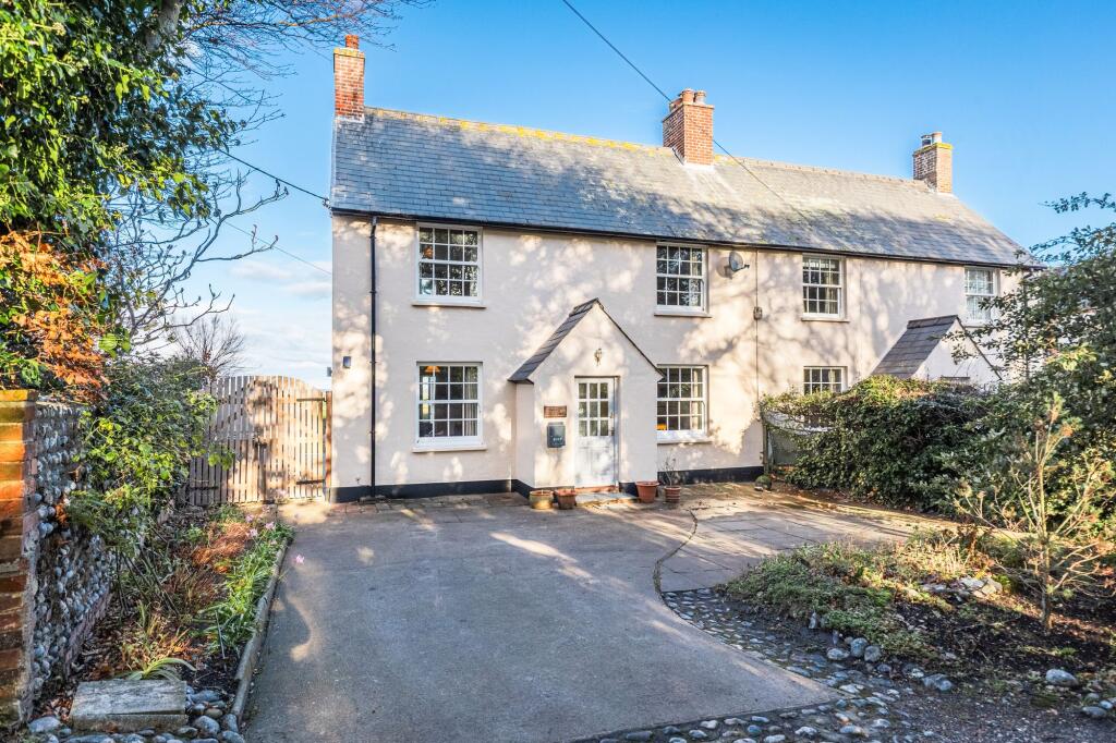 Main image of property: Elevated Period Home with Stunning Marsh and Sea Views in Cley