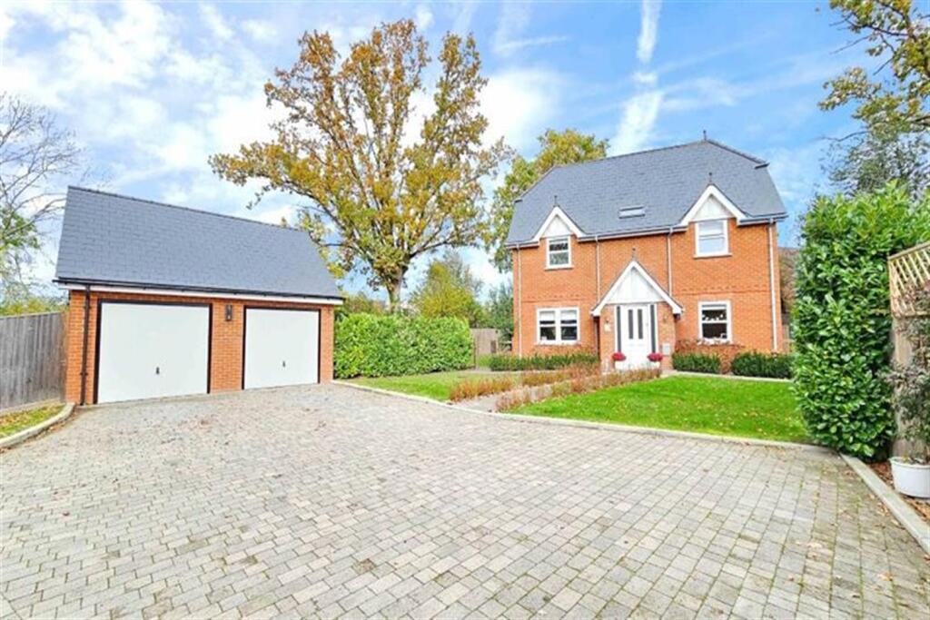 Main image of property: 4 bedroom Detached House in Woking