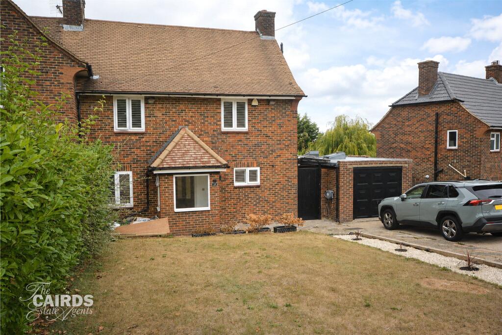 Main image of property: Downland Way, Epsom, Surrey, KT18