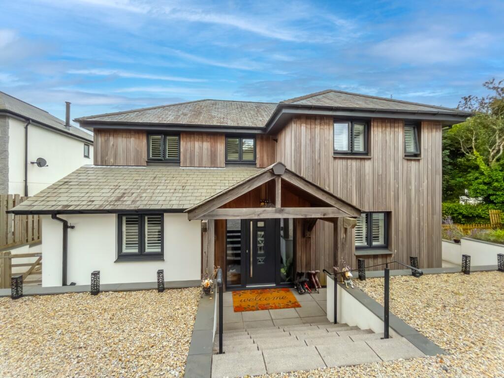 Main image of property: Crowntown, Stunning detached four bedroom home