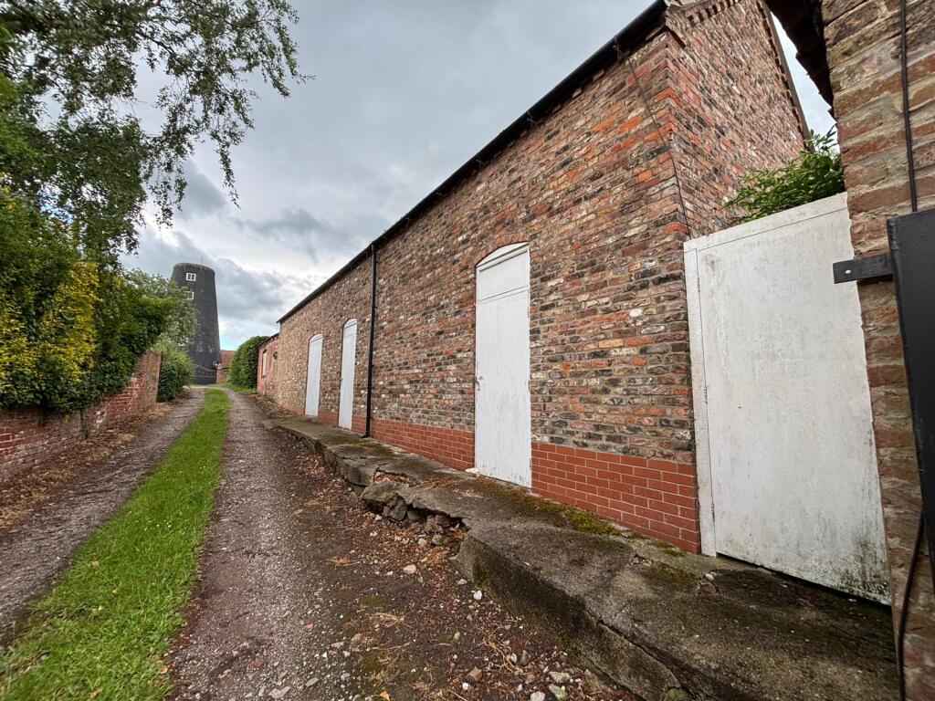 Main image of property: The Old Barns, High Street, Blyton, Gainsborough DN21 3JY