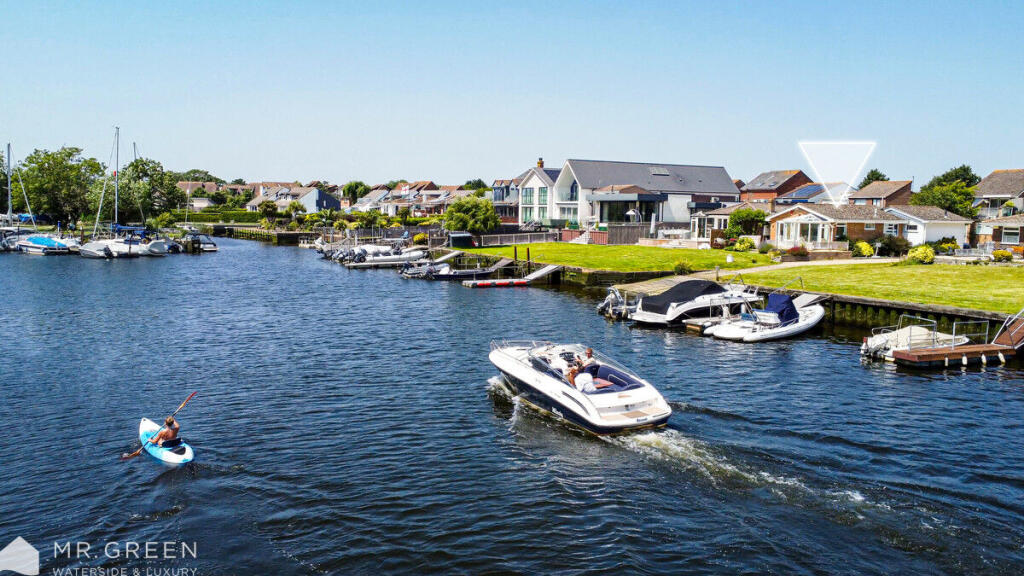 Main image of property: Directly on the River, Christchurch, BH23 1JJ