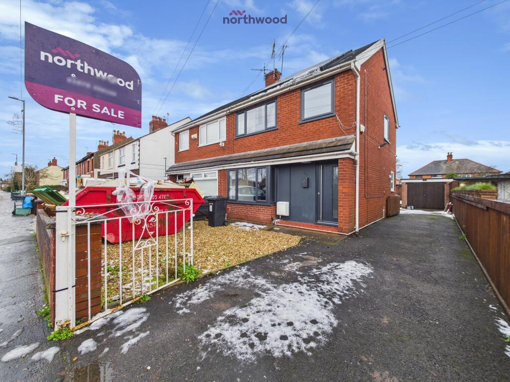 Main image of property: New Road, Wrexham, LL11
