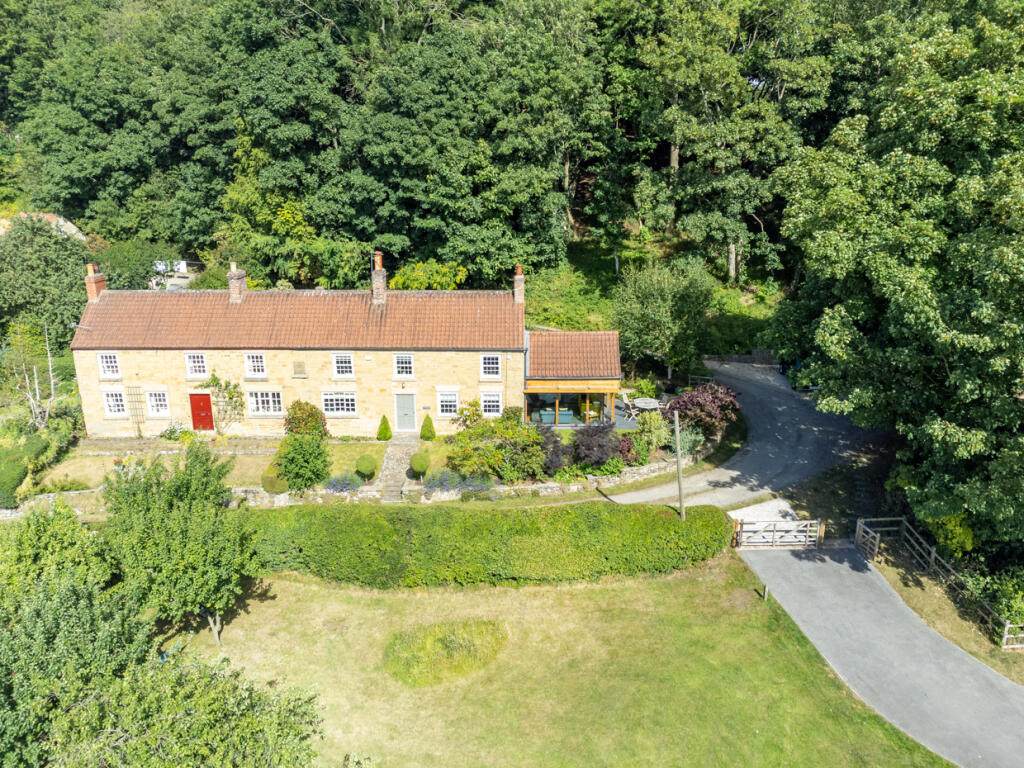 Main image of property: 2 Woodside, Brandsby, York, YO61 4RE