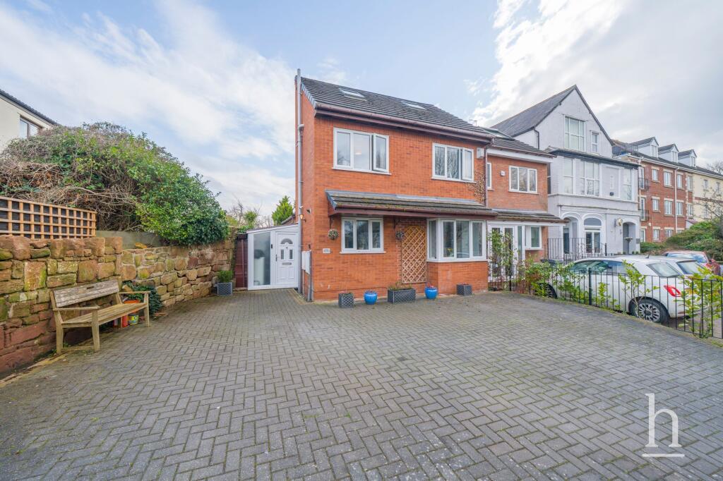 Main image of property: Sandy Lane, West Kirby, CH48