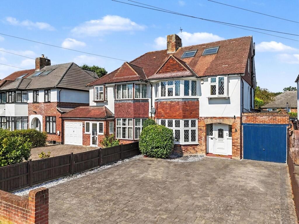 Main image of property: Manor Road North, Esher, KT10