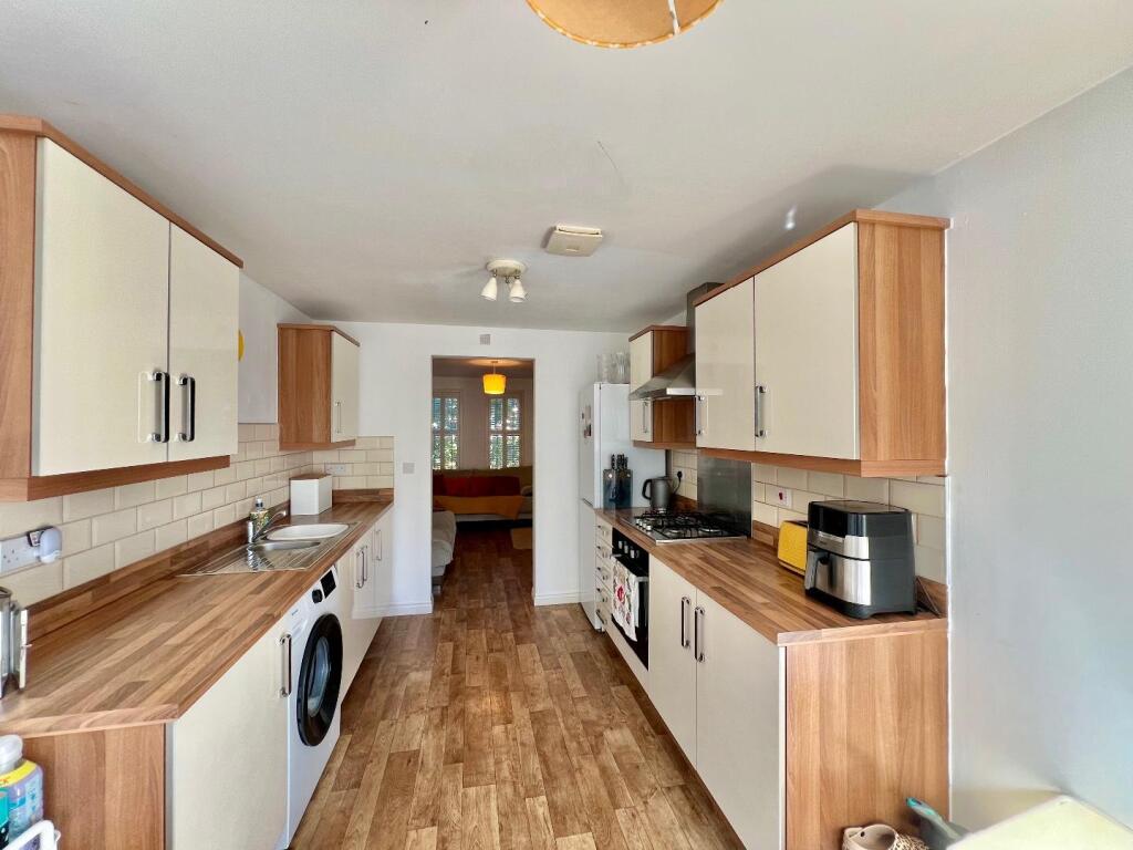 House in Coity - More