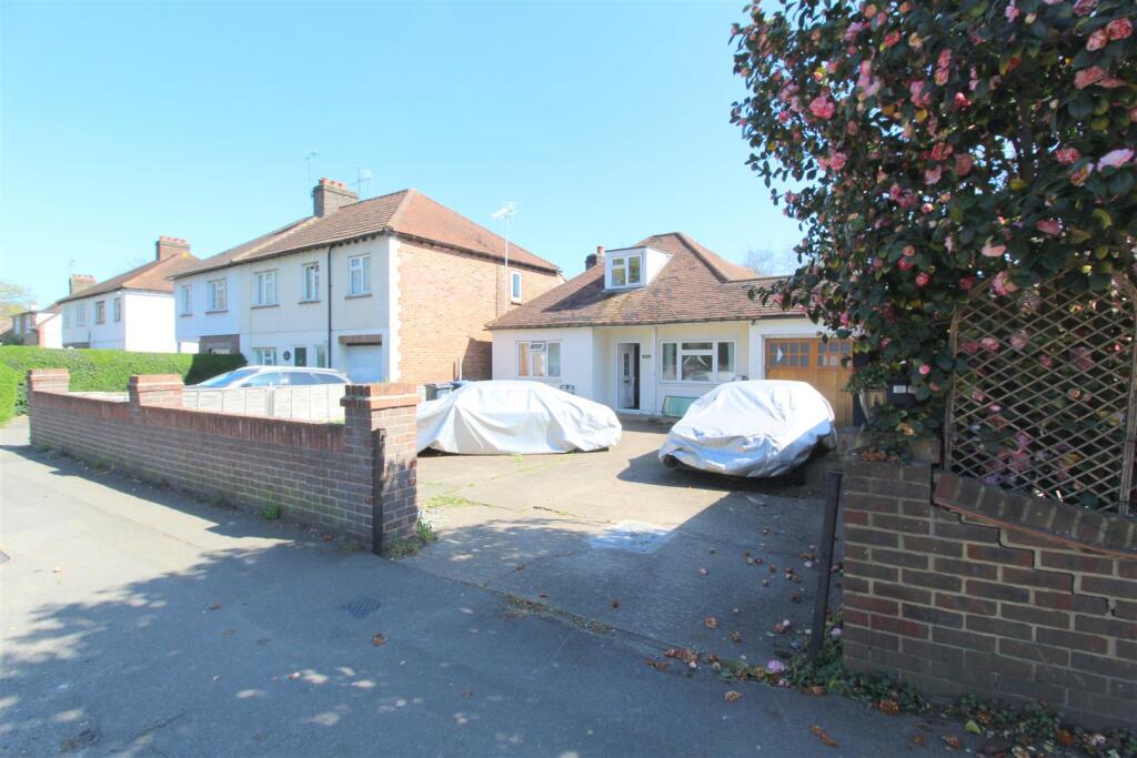 4-bed bungalow on Woodham Lane, New Haw, £650,000