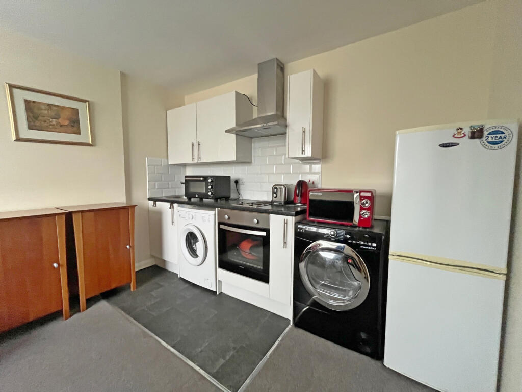 Main image of property: Wood Lane, Isleworth, TW7