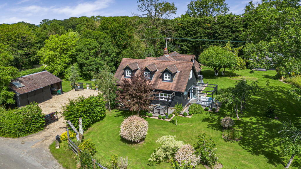 Main image of property: Malham Lodge, Roundstreet Common