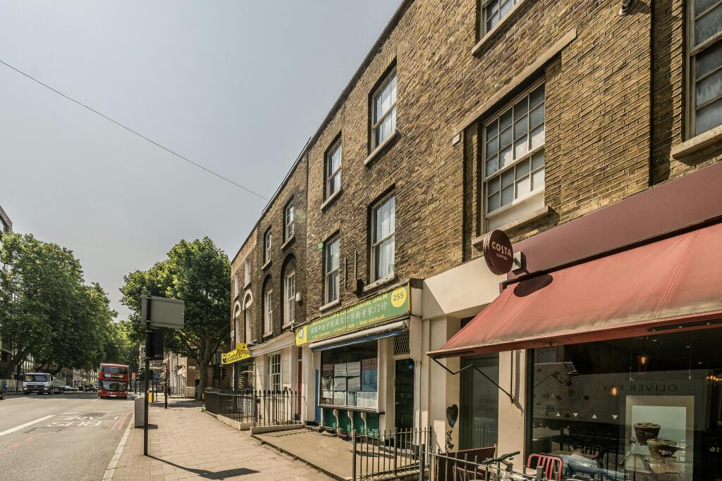255 Grays Inn Road StreetFacing Commercial Buildings With Shops And Restaurants.jpg