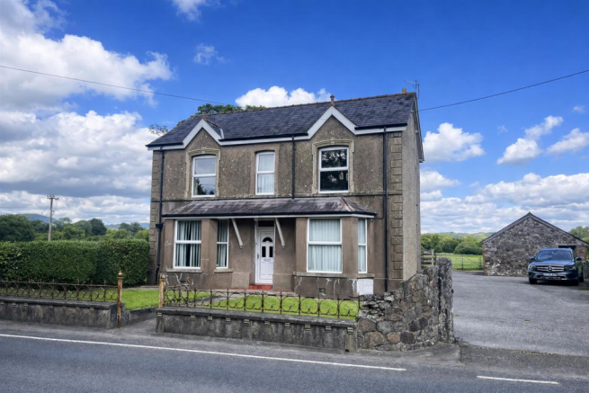 Country house beside a quiet road.png