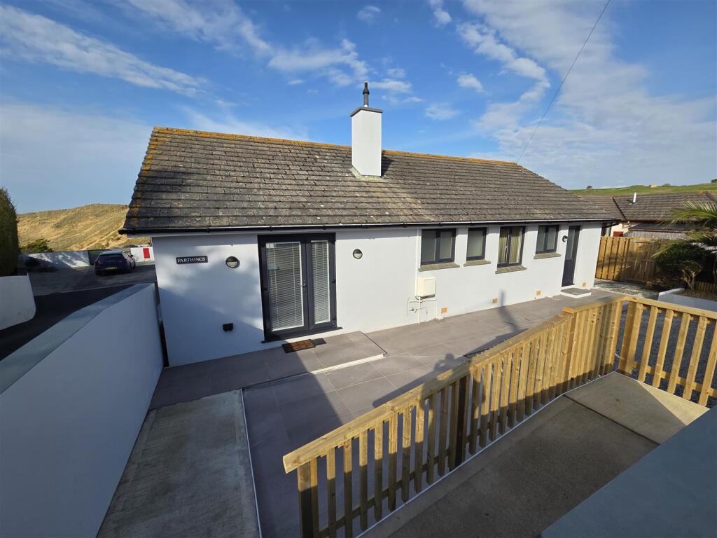 Main image of property: Holywell Bay