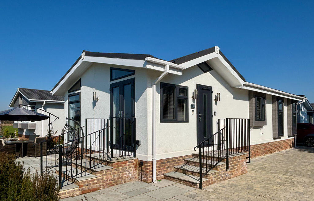 Main image of property: Almost New Luxury Park Home With Stunning Views Towards The River Wey