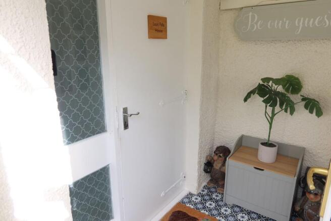 EXTERNAL ENTRANCE PORCH TO HOUSE &amp; COTTAGE: