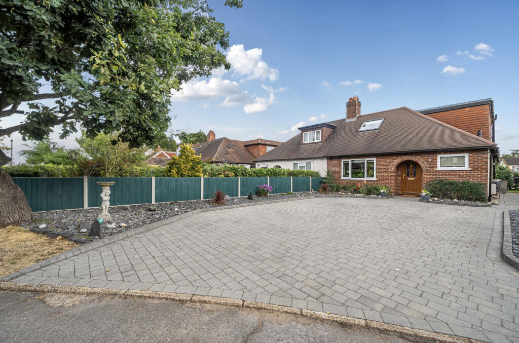 Main image of property: Downsview Avenue, Woking, Surrey, GU22