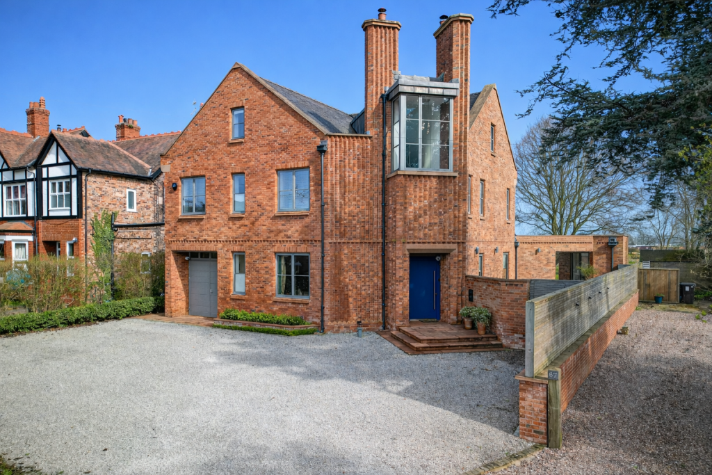 Main image of property: The Chimneys Mill Lane, Lymm, WA13 9SG