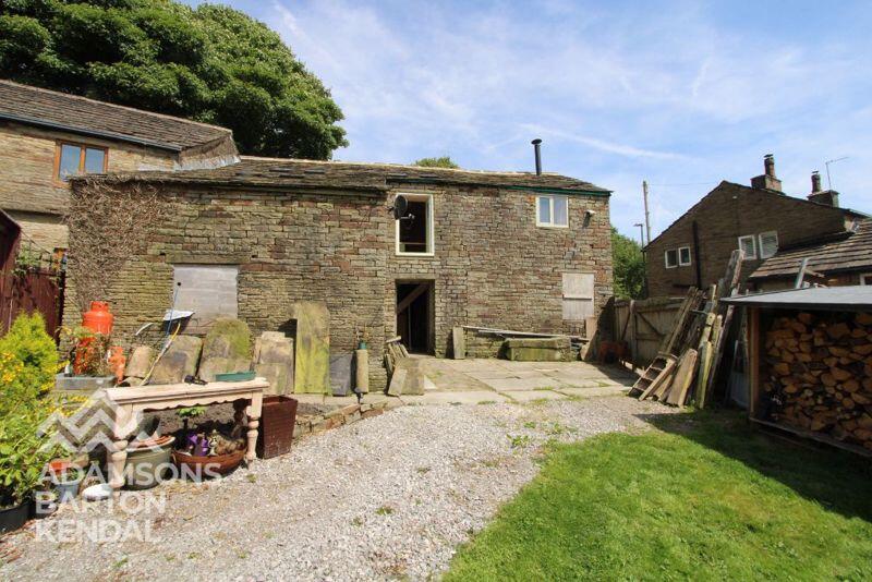 Main image of property: Tong End, Whitworth, OL12