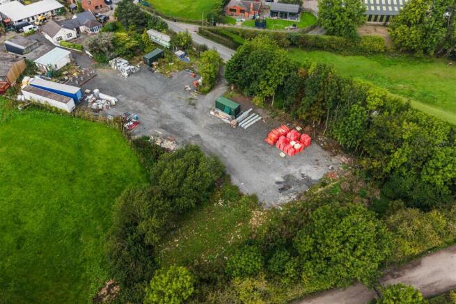 THE SITE AS IT STANDS