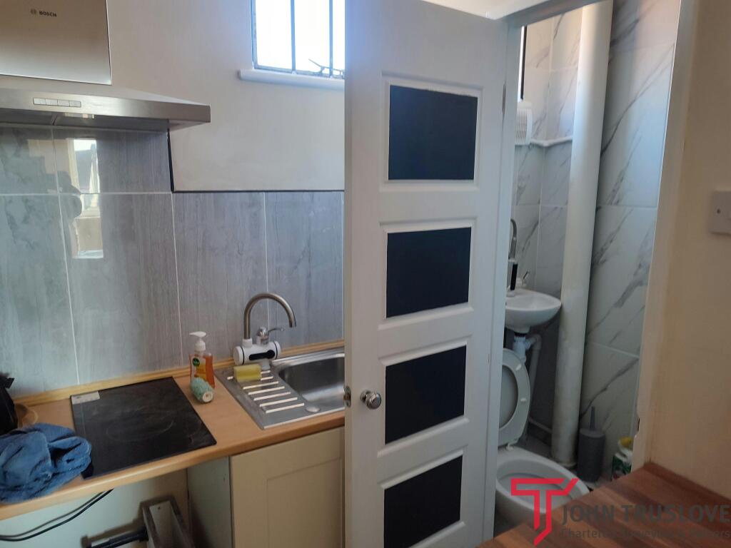 upstairs kitchen toilet.jpg