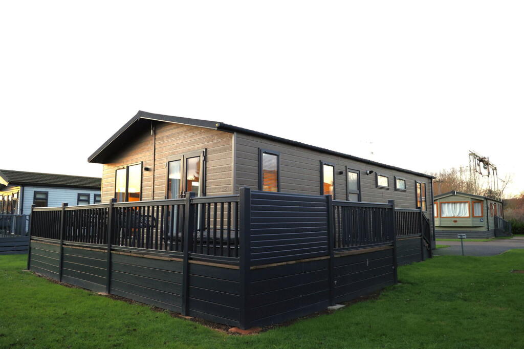 Main image of property: Lodge located on Roydon Marina Village, CM19 5EJ