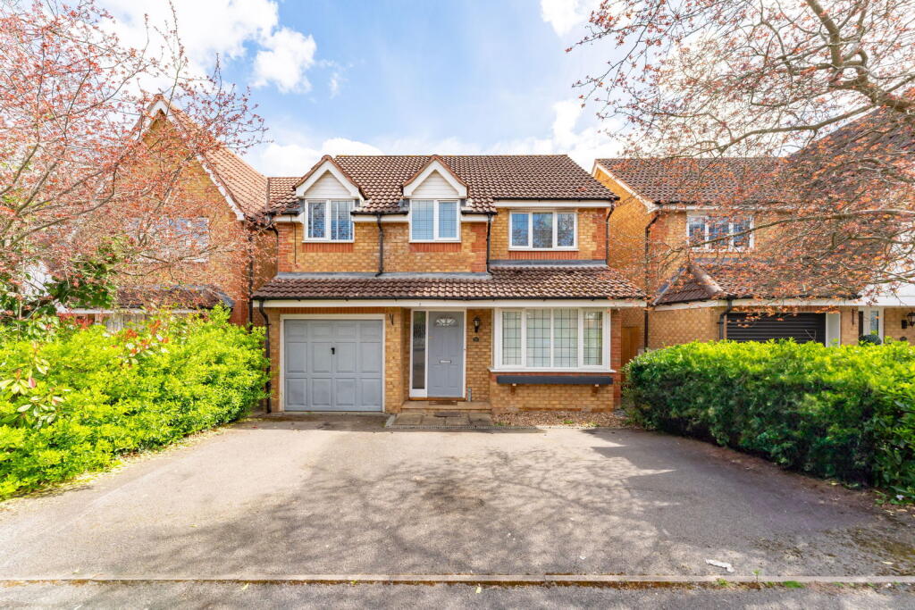 Main image of property: Redwoods, Row Town, KT15