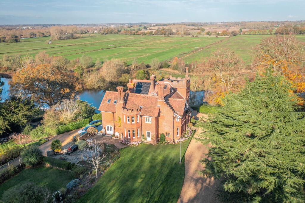Main image of property: Exceptional Home with Fine Views and River Frontage