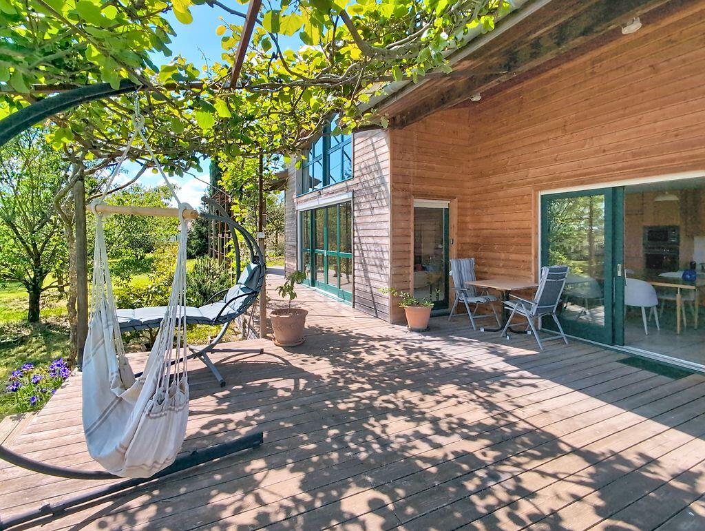 Main image of property: Bright wood-built house with garden and views near, Montelimar