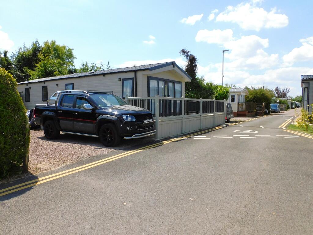 Main image of property: Heron Orchard Holiday Park, Frostley Gate