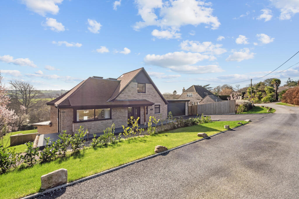 Main image of property: Harman's Cross