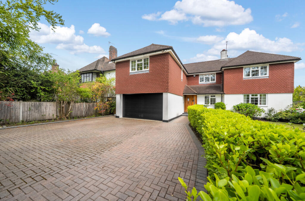 Main image of property: The Riding, Woking, Surrey, GU21