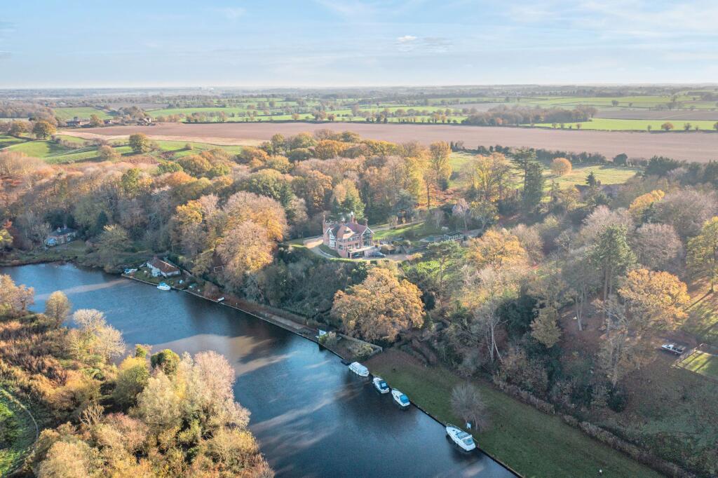 Main image of property: Exceptional Home with Fine Views and River Frontage