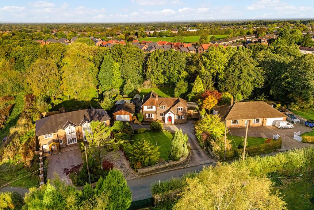 Main image of property: Moggie Lane, Adlington, SK10