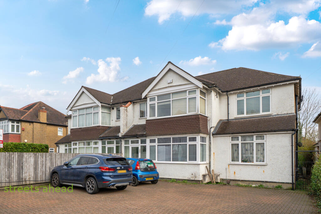 Main image of property: Woodcote Grove Road, Coulsdon, CR5