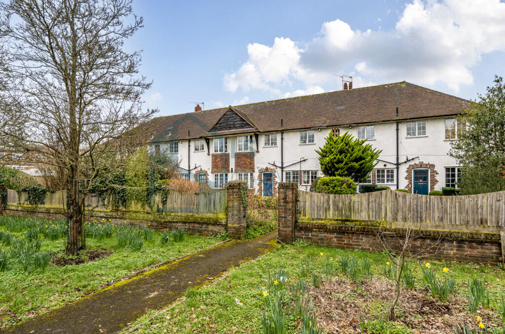 Main image of property: Heathlands, 26 Queens Road, Weybridge, KT13 9UY