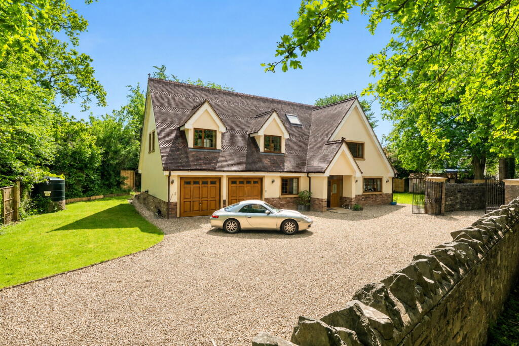 Main image of property: A Woodland Glade Set Away Off Station Road