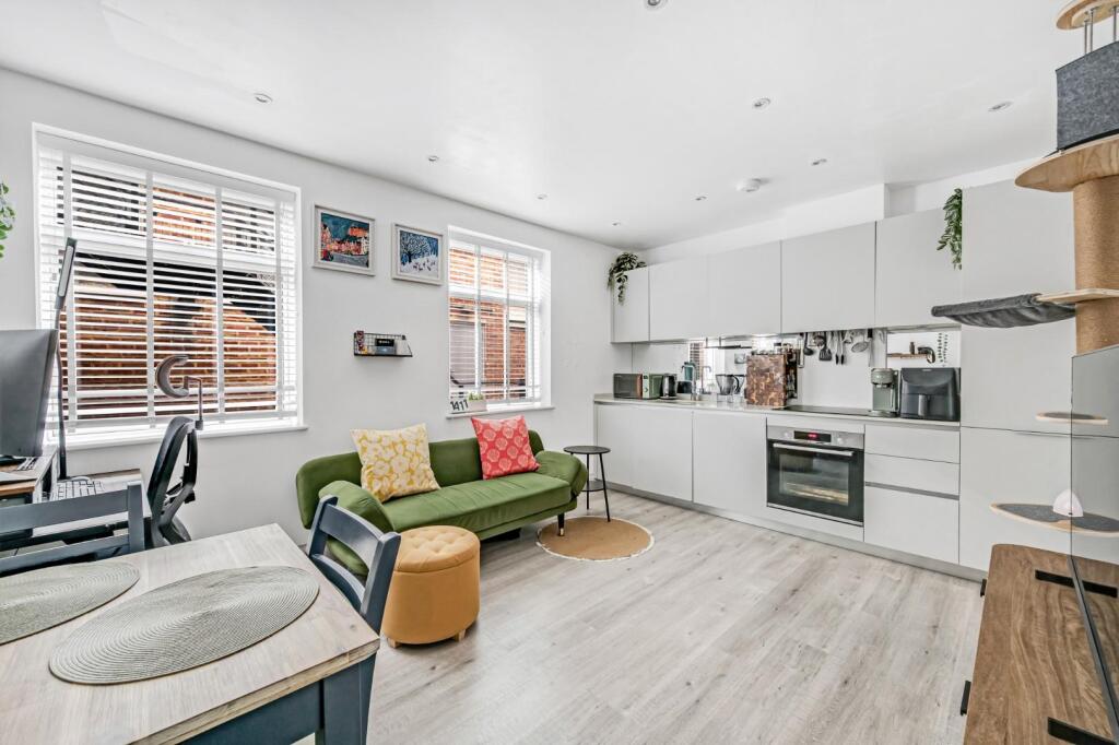 Main image of property: Devonhurst Place, Turnham Green, London